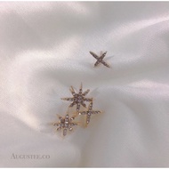 Gold shooting star earrings