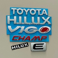 โลโก้ TOYOTA HILUX VIGO CHAMP E สติ๊กเกอร์ HILUX สีโครเมี่ยม ตัวหนังสือฝาท้าย (จำนวน 6 ชิ้น)