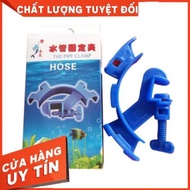 Aquarium water change pipe holder