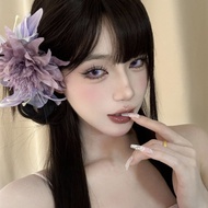 Purple flower hair clip, spooky fashion photography accessory, anemone flower