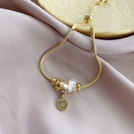 18K Gold Charm Bracelet