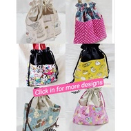 Cinnamon drawstring lunchbag/pouch. 2 way bag. 4 pockets. Reversible. Japanese/ Hello kitty/Tokidoki and more