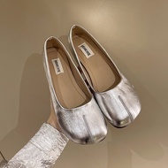 Woman with round toe flats and slip-on flats