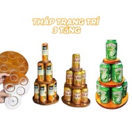 3-storey wooden tower decorated with beer and soft drinks - 3-storey water tower displaying altar on