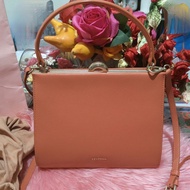 original J estina kisslock sling bag