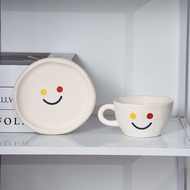 Smiley face coffee cup with saucer made of rough ceramic with Smiley face pattern, simple Retro styl