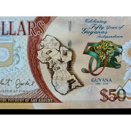 Guyana commemorative banknotes.unc.