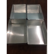 Cake pan size 10, 3, x 7, 3, and 3