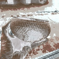Bowl with cut patterns