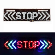 Waterproof motorcycle LED tail lights display the word STOP