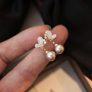 ต่างหูมุกสีแชมเปญ MIKIMOTO รุ่นใหม่ปี 2026 ดีไซน์เก๋ไก๋หรูหรา ต่างหูมุกสีแชมเปญ ต่างหูรูปผีเสื้อ ต่า