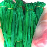 Plastic mesh bag covered with grapefruit, mesh bag for onions, BLUE plastic mesh bag for fruit