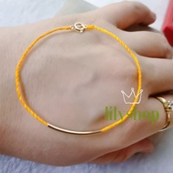 Lucky us10k gold and 71 string jewelry bracelet
