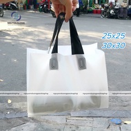 PE ceramic bag with black handle, horizontal bag form for storing cosmetics and clothes