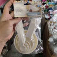 004. Set Of 9 Measuring Spoon Cups Plastic White PN120/922