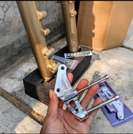 dudukan breket kaliper nissin brembo monoblok 4 piston kaliper kiri kidal serpico disc 300 mm  skok 