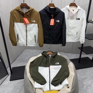 NORTH FACE ฤดูร้อนกีฬาชายและเสื้อโค้ทกันลมสตรีชั้นเดียวแสงและการป้องกันรังสียูวีสำหรับการใช้งานกลางแ