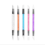 2-headed silicone tool for shaping clay mouth/lip, used to apply clay and apply resin