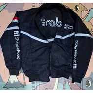 JAKET GRAB HOTAM SOPI HITAM JAKET BOLAK BALIK GAK CEPET KOTOR ANTI AIR LOGO BORDIR SEMUA READY M L X