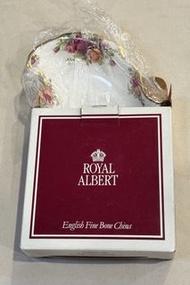 A collectible Royal Albert fine bone china cake plate and server set, likely featuring the classic "