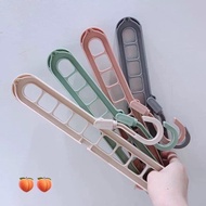 Space-saving 9-hole clothes hanger