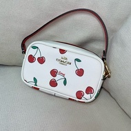 全新COACH 蔻馳 粉紅櫻桃圖印 手拿包 情人節限定 CF405