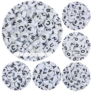 Package of 15g (~100-105 beads) of letter beads, black number beads with white background according 