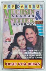 Kaset pita bekas pop dangdut Muchsin vs titik Sandora