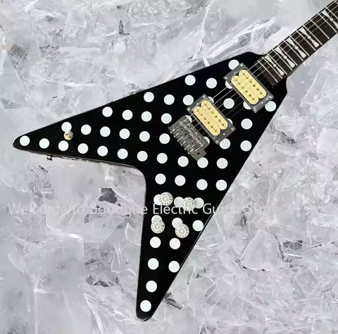 Customized Flying V electric guitar by Randy Rhoads - Polka in black and white with dot pattern and 