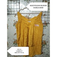 SLEEVELESS YELLOW BLOUSE