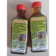 MINYAK AKAR KAYU (CAP AYAM BERLAGA)