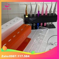 Shelf for eyelash extension tweezers