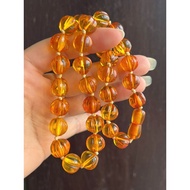 Natural tiger necklace with light blooming pumpkin 10.6 to 13 mm knotted each piece, 43 - 44 cm long