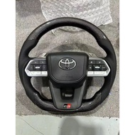 HILUX REVO CARBON STEERING WITH PADDLE SHIFTER LC300 STYLE