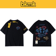 Bkmk เสื้อยืดแขนสั้น พิมพ์ลายกราฟฟิติหน้ายิ้ม สีดํา แฟชั่นฤดูใบไม้ผลิ สําหรับผู้ชาย และผู้หญิง