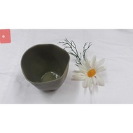 Distorted cylindrical cup with real photo