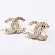 全新 Chanel 經典金色星芒刻紋雙c logo耳環/針式耳環