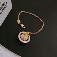 英國知名設計師品牌Vivienne Westwood經典粉色土星立體珍珠手鍊 代購服務