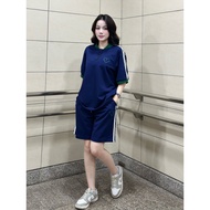 STREET WEAR Jewis Shorts Set Charcoal Green Collar with Heart Logo Printed with White Stripes Person