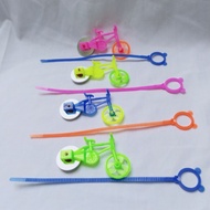 Pull bike toy, spinning bike