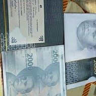Uang kertas pecahan 2000rupiah ,UNCUT 2X, UNC, bonus folder BI dan SER