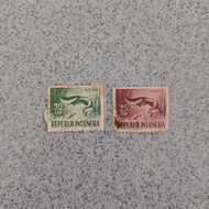 2 pieces of Indonesian used Stamps, UNGSANG fauna series, year 1956 worth 20 cents, 25 cents