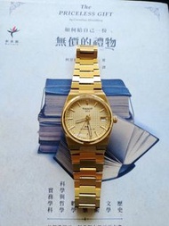 Tissot 天梭 PRX Powermatic 80小時 35mm 黃金PVD鬆餅面自動上鏈機械錶 70年代復刻機械錶
