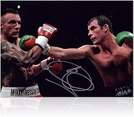 Joe Calzaghe Signed Boxing Photo: Fighting Mikkel Kessler