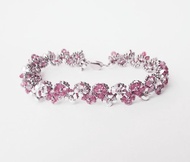 小花手鍊, 施華洛世奇元素