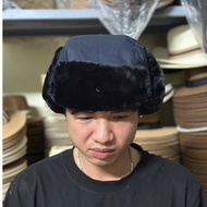 Green fur hat - winter hat lined with fur to keep heat