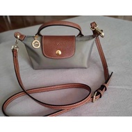 mini Longchamp sling bag