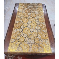 Gold plastic PVC table mat measuring 60 cm x 120 cm