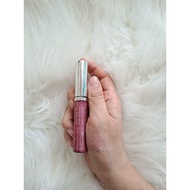 Liquidation of colored glitter lip gloss