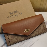Sk Ocean กระเป๋าสตางค์โค้ชแท้ แบบฝาพับ สีน้ำตาลลายซ๊ เอ้าเลท 7.7 นิ้ว หนังแท้